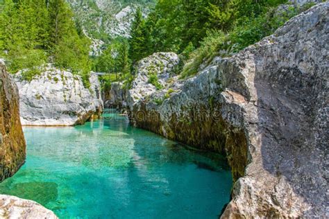 Emerald Colored Water At The Great Soca Gorge In Slovenia Surrounded By