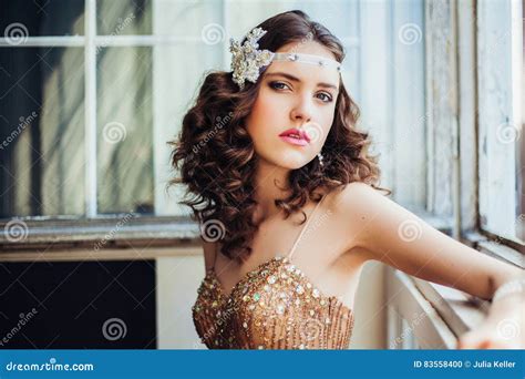 Fashion Photo Of Beautiful Girl Wearing Sparkling Evening Dress Stock