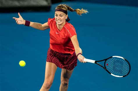 Travel the world playing tennis, always smiling. Petra Kvitova in Red Dress at 2019 Sydney International ...