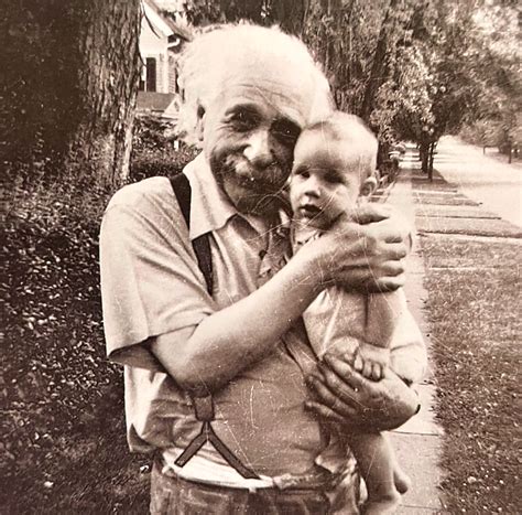Albert Einstein Holding His Neighbors Son I Thought It Belonged On