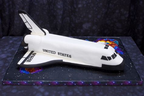 Cake is half chocolate and vanilla with buttercream icing. Space Shuttle Birthday Cake - CakeCentral.com