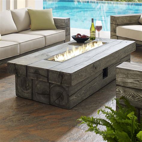 This sleek rectangular outdoor fire pit table will look perfect in any backyard, creating a lasting impression for anyone visitor. Manteo 70" Rectangular Outdoor Patio Fire Pit Table