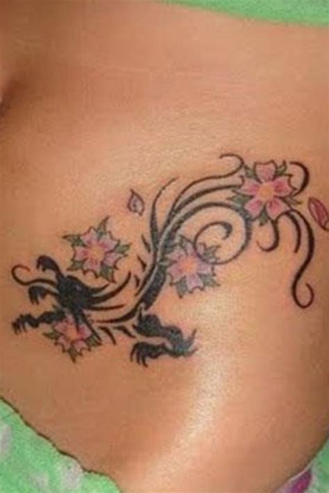 Nowadays they combine the style of original tribes and modern features. Small flower design tattoo | Tribal tattoos for women ...