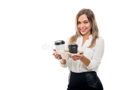 Young Pretty Business Woman Holding Cups Of Coffee To Go Stock Photo