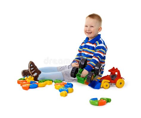 Little Boy Playing With Color Toys On Floor Stock Photo Image Of