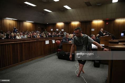 Oscar Pistorius Walks Across The Courtroom Without His Prosthetic