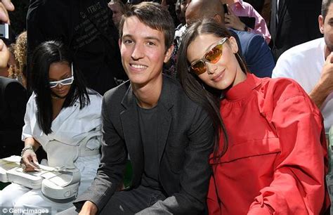 Bella Hadid Commands Attention In Red Romper Suit And Sheer Tights Daily Mail Online