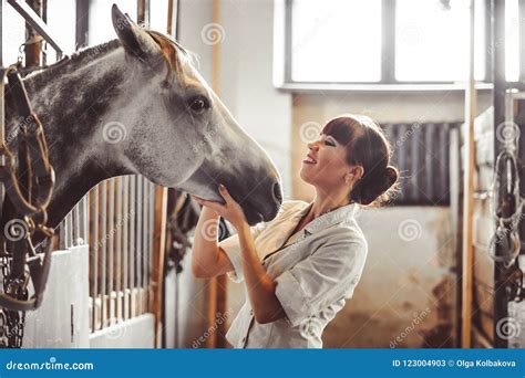 Woman Stroking The Horse Stock Image Image Of Blond 123004903