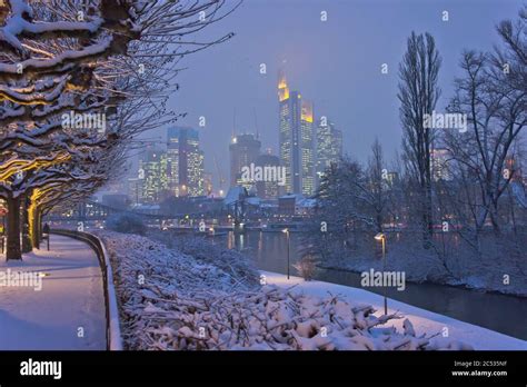 Frankfurt Modern City River View By A Snowy Night Germany Stock Photo
