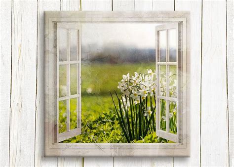 An Open Window With White Flowers In Front Of A Green Field And Wooden