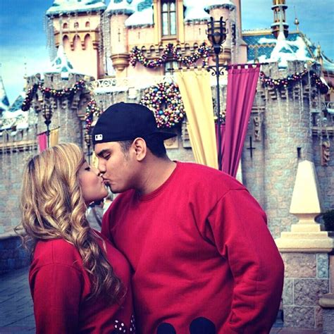 Disneyland Couple Kissing In Front Of Sleeping Beauty Castle