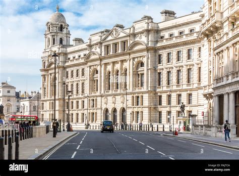 London Street And Beautiful Old Buildings Along The Street Stock Photo