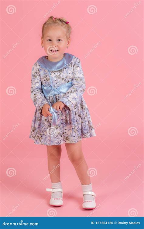 Studio Portrait Of A Little Girl Stock Photo Image Of Clothing