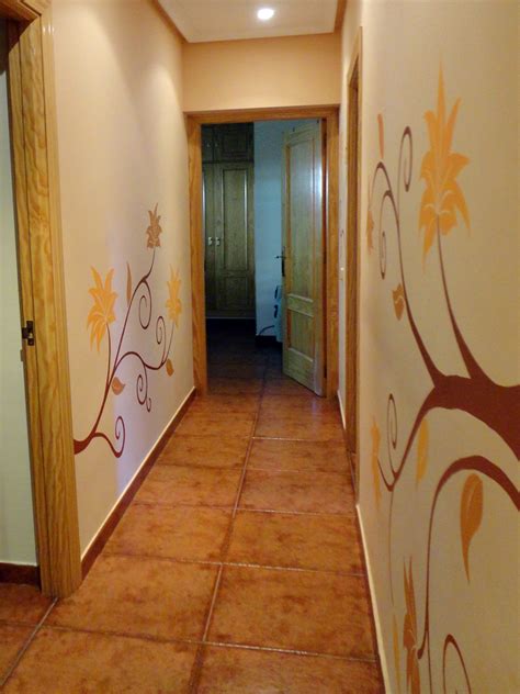 Pasillo largos y estrechos.recursos y soluciones decorativas para planificar y aprovechar piso en el eixample de barcelona thinking home pasillos, vestíbulos y escaleras de estilo clásico | homify. pasillos con vinilos | Hoy LowCost