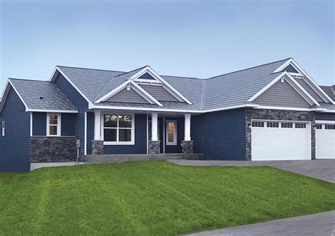 Navy Blue House With Black Metal Roof - Design Talk
