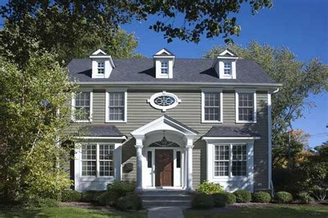 Additional plantings provide colorful accents near the front door. Paint Color Ideas for Colonial Revival Houses | Colonial ...