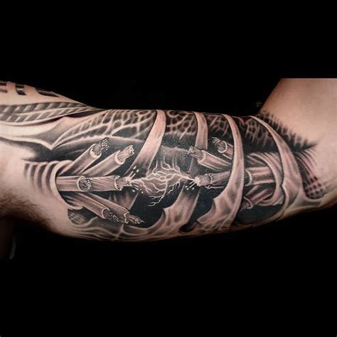 24 Upper Arm Tattoo Designs For Men