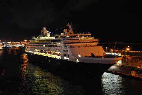 Cruise Ships At Night In Barcelona And Civitavecchia