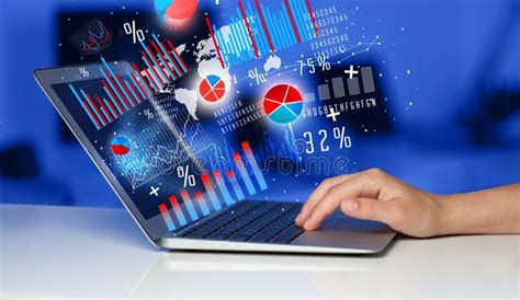 Hand Typing On Modern Laptop Notebook Computer With Graph Icons Stock