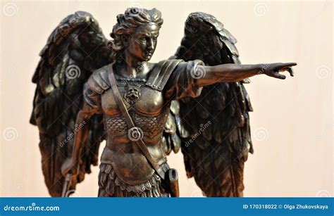 Bronze Sculpture Of Archangel Michael With Wings And Sword Stock Photo