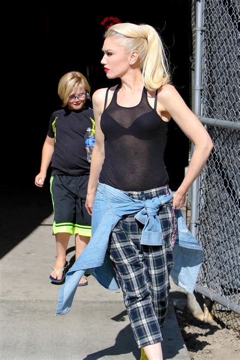 Cover Up Mom Gwen Stefani Exposes Her Bra In A See Through Top While