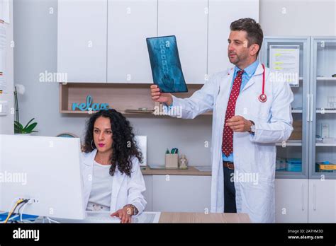 Nurses Doctor Examining Male Patient Hi Res Stock Photography And