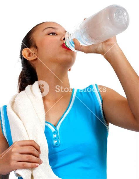 Thirsty Girl Drinking Water After Exercise Royalty Free Stock Image