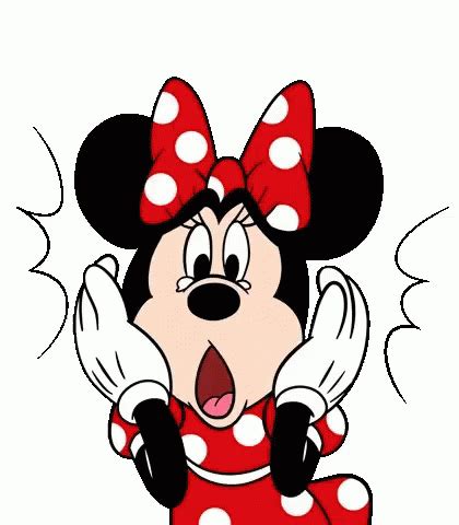 Minnie Mouse With Red And White Polka Dots On It S Head Making A Goofy Face