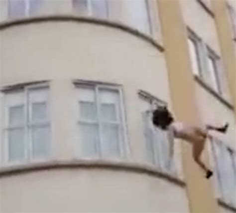 Video Woman In Underwear Survives Three Storey Jump From Burning Building Daily Star