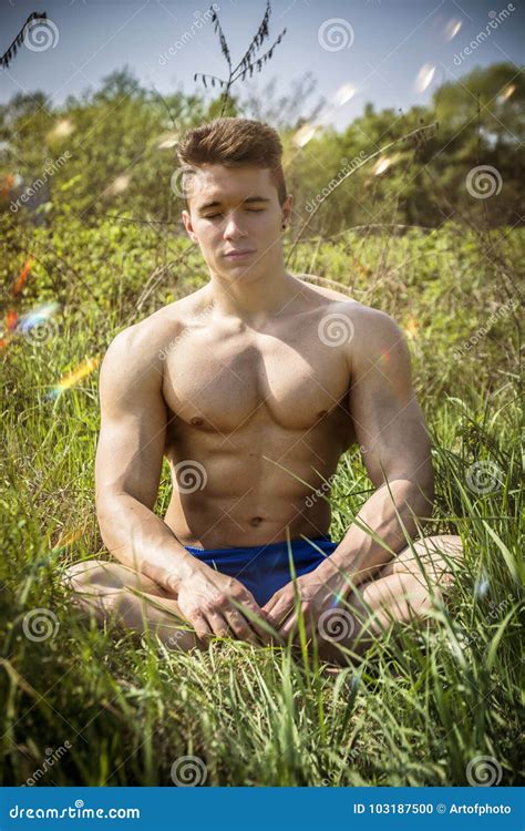 Young Muscular Shirtless Hunk Man Outdoor In Nature Stock Photo Image