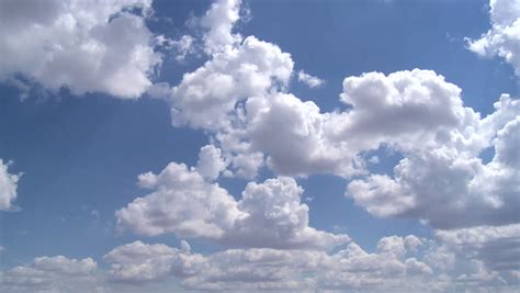 Time Lapse Of Puffy White Clouds In Blue Sky Stock Footage Video