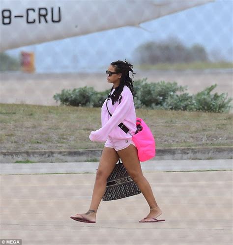 Rihanna Dons Pink Shorts At The Airport After Bridesmaid Duties In Best Friend S Barbados