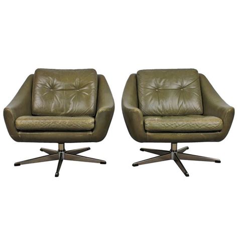 Jenson distressed leather dining chairs. Dark Olive Green Leather Mid Century Modern Lounge Chairs ...