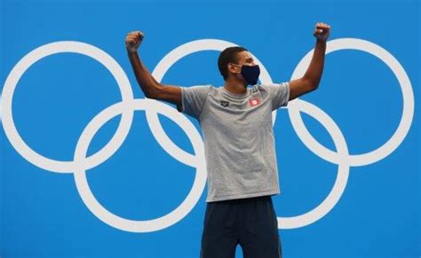 tunisian teen wins surprise olympic swimming gold menafn
