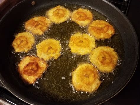 Fried Plantains In A Frying Pan With Oil Puerto Rico Food Stock Image