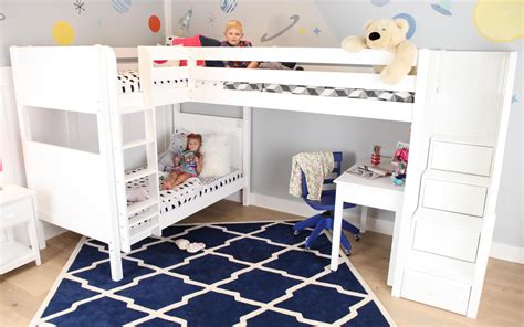 There is a lower bunk or tier and another bunk mounted above it to make another tier. Twin High Corner Loft Bunk Bed with Ladder + Stairs | Loft bunk beds, Bed for girls room, Corner ...