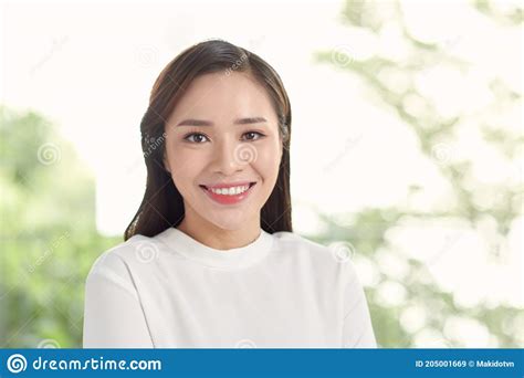 Young Beautiful Asian Business Woman Standing In Office Stock Image