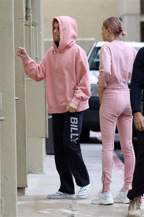 hailey baldwin bieber and justin bieber wore matching pink outfits while stopping by west valley