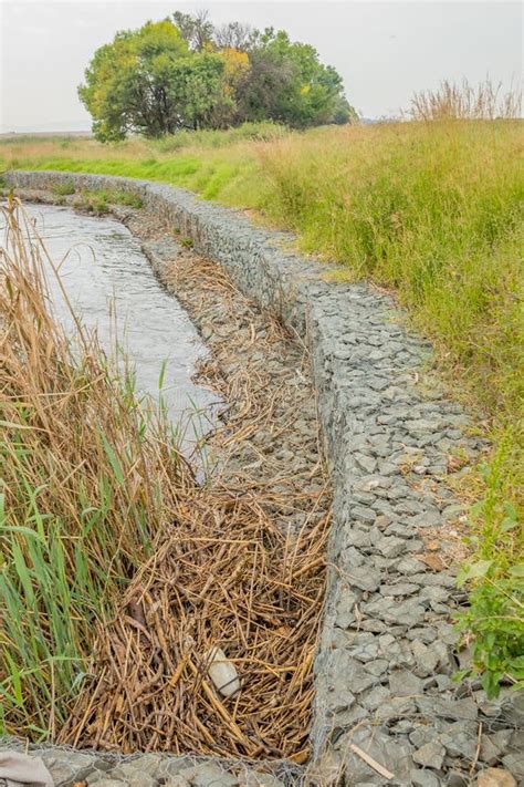 Gabion Retaining Walls On The Bank Of A River Stock Photo Image Of