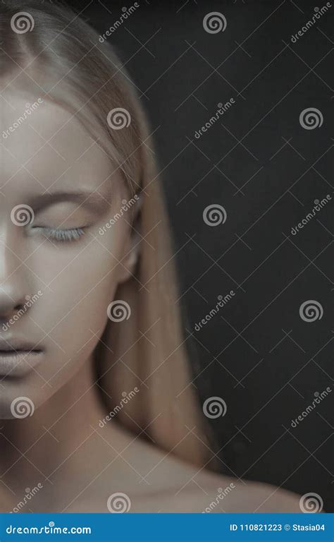 Portrait Of Half Face Young Albino Woman With Closed Eyes Stock Image