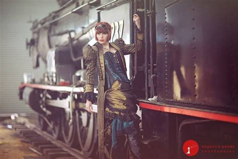 A Woman Standing On The Side Of A Train