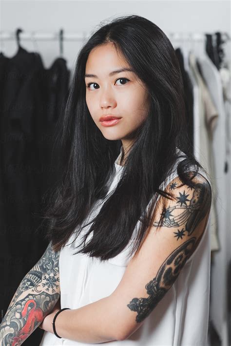 Portrait Of A Young Asian Fashion Designer With Many Tattoos By Giorgio