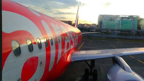 Flexible on when you visit? AirAsia Flight Review: Manila to Kuala Lumpur Economy ...