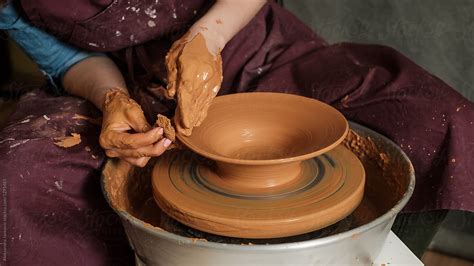 Anonymous Woman Making A Bowl On The Pottery Wheel By Stocksy Contributor Aleksandra Jankovic
