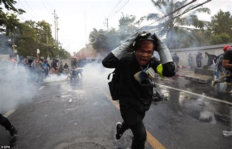 Thai Cops Fire Water Cannons At Anti Monarchy Protesters After They