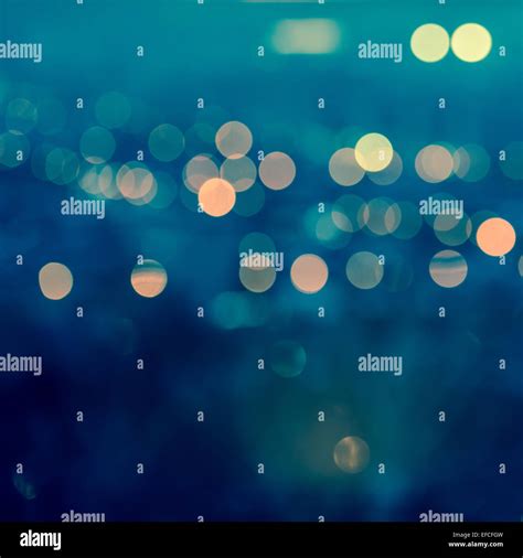 City Blurring Lights Abstract Circular Bokeh On Toned Blue Background
