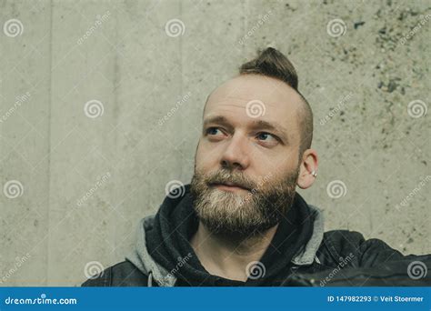 Man Is Looking Up In Front Of A Wall Stock Image Image Of Model Casual 147982293