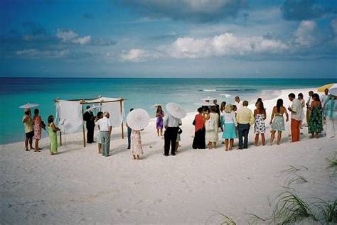 Arches, chairs, and runways 7 days a week. Beach wedding with no chairs :) | Winter beach weddings ...