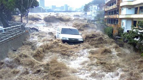 Mauritius Flash Flooding Cars Float Down The Streets Of Port Louis As