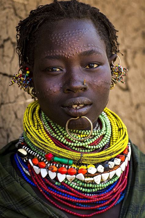 Topossa Woman In Kangate Ethiopia Facial Scarification Piercings